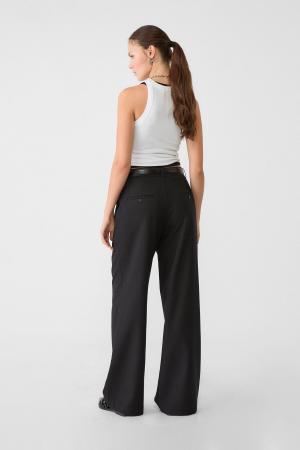 Belted and wide-leg fabric trousers